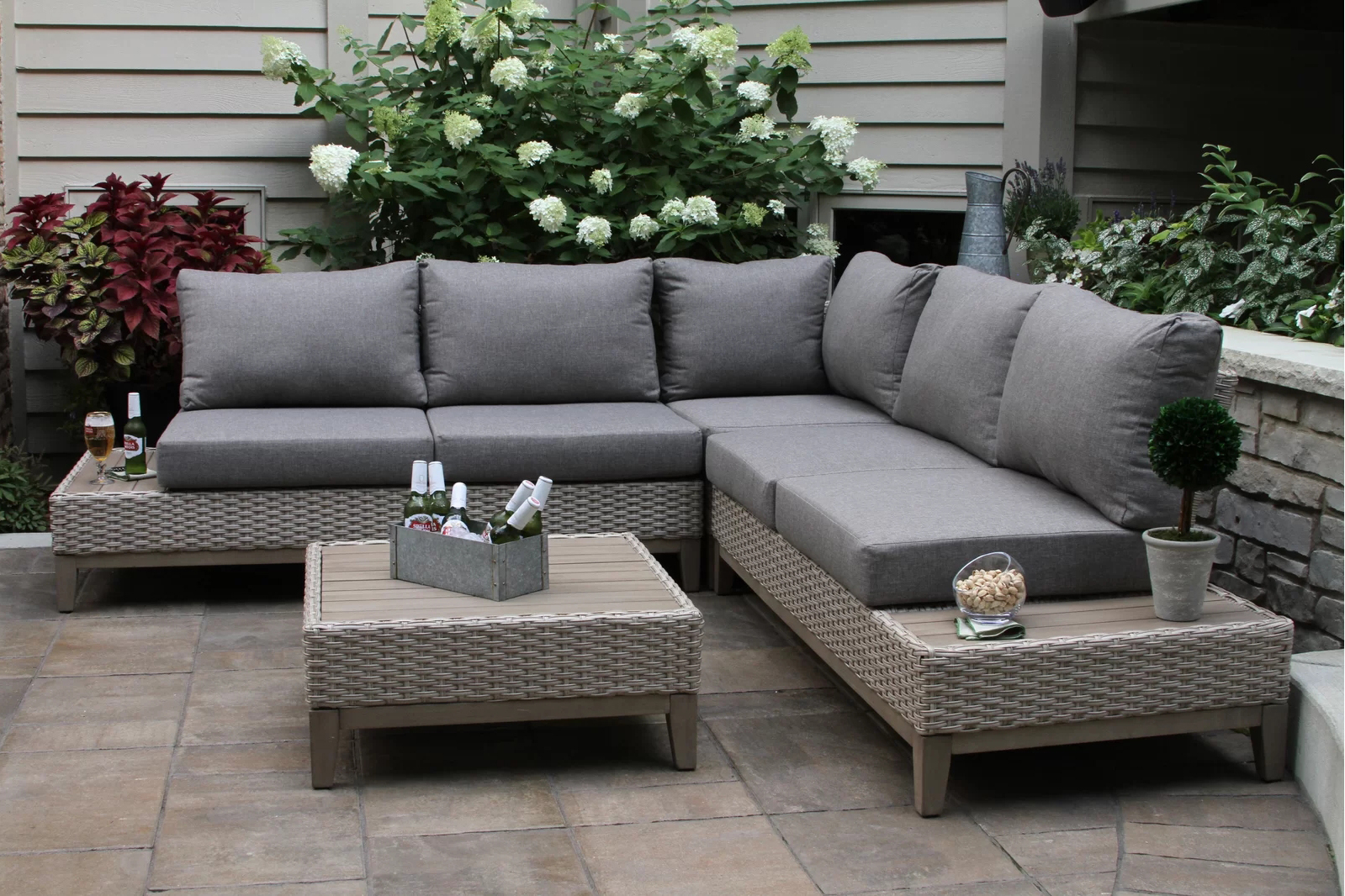 4 Piece Rattan Sectional Seating Group with Cushions